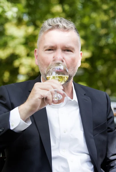 Man with a glass of wine — Stock Photo, Image