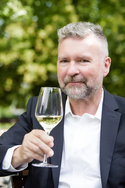 Man with a glass of wine — Stock Photo, Image