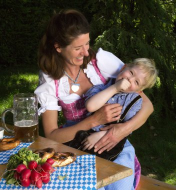 bavarian boy with mother clipart
