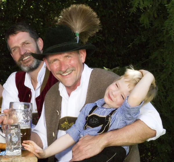 Two bavarian men and a boy — Stock Photo, Image