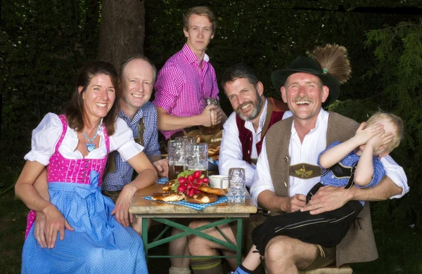 Bavarian family in the park — Stock Photo, Image