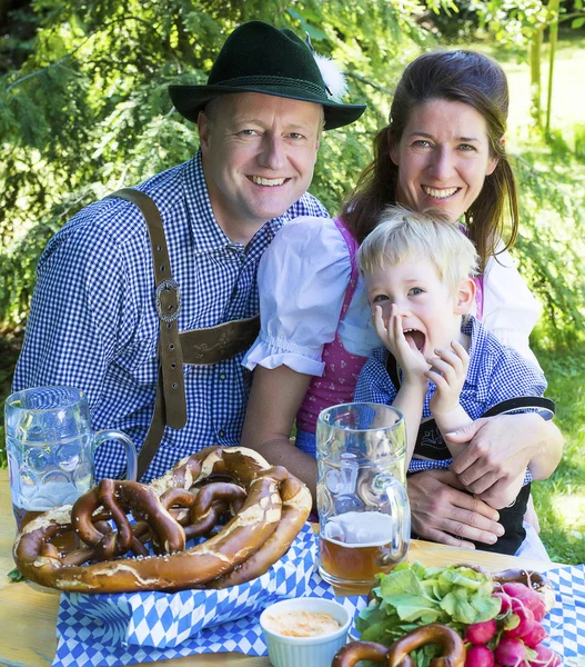 Bavarian family in park — Stock Photo, Image