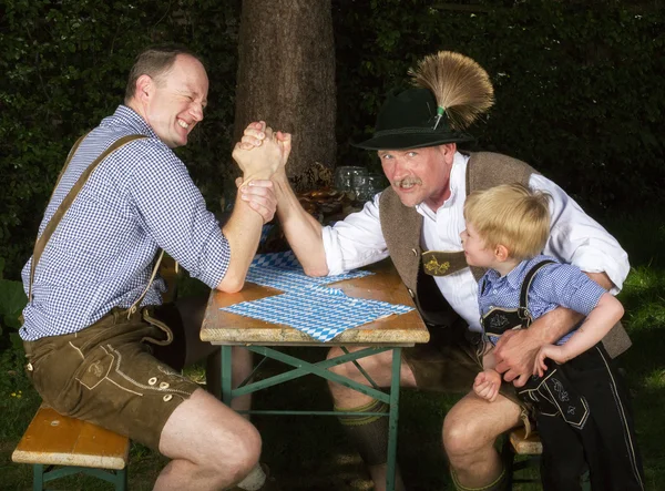 Two bavarian men and a boy — Stock Photo, Image