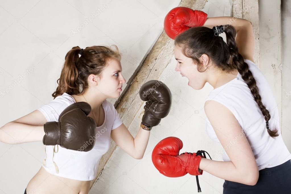 Two girls as boxers