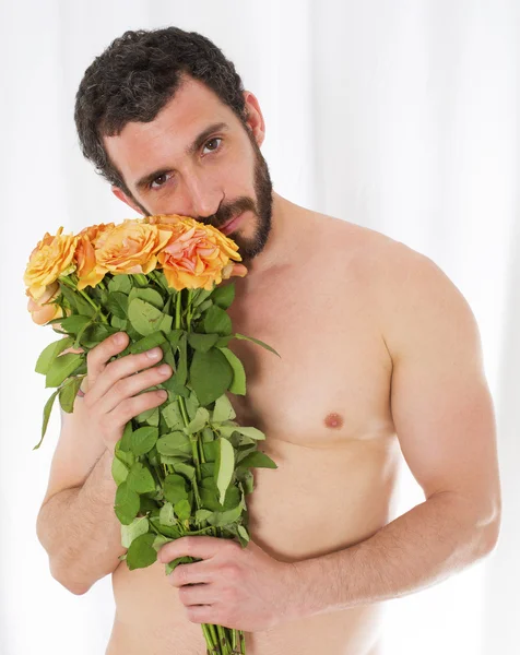 Muž s růží — Stock fotografie