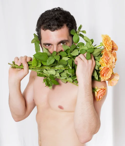 Hombre con rosas — Foto de Stock
