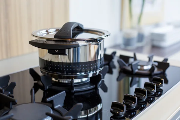 Pot on stove — Stock Photo, Image