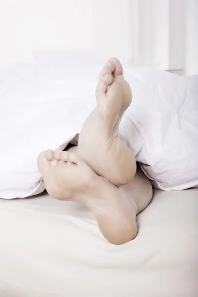 Piedi a letto — Foto Stock