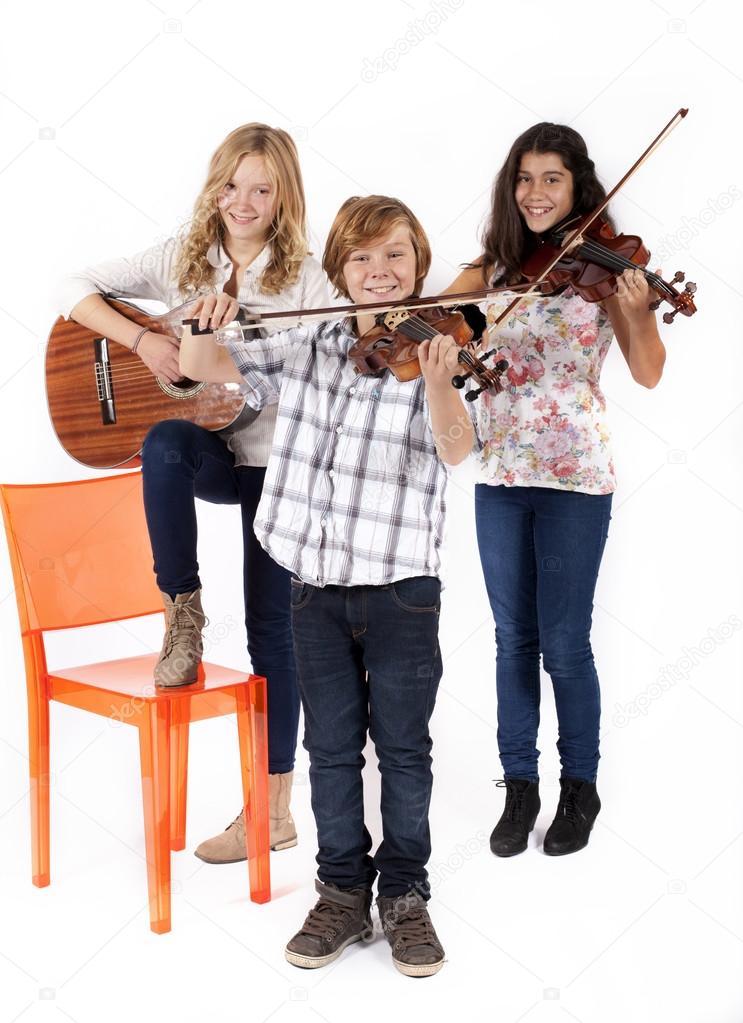 girls and a boy with musical instruments
