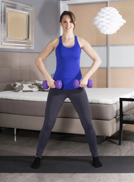 Woman exercising at home — Stock Photo, Image
