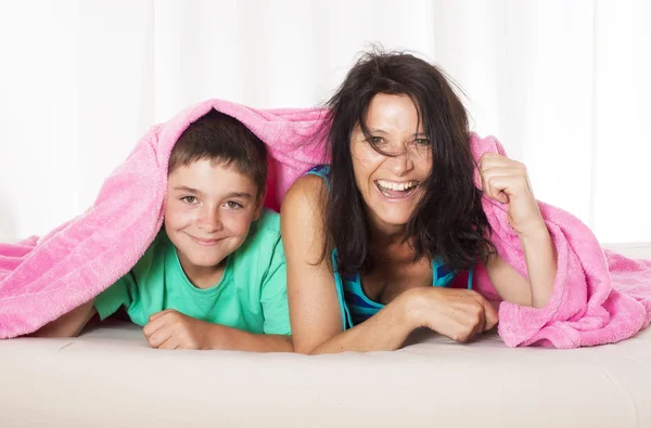 Mother and son in bed — Stock Photo, Image