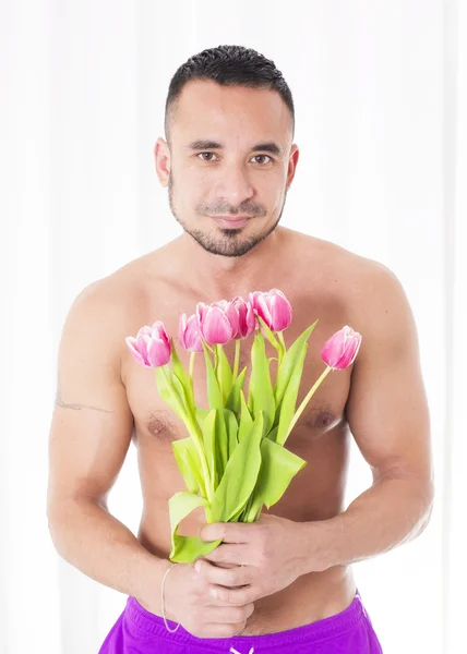 Man met bloemen — Stockfoto