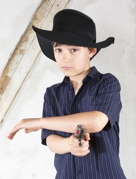 Jovem menino como um cowboy — Fotografia de Stock