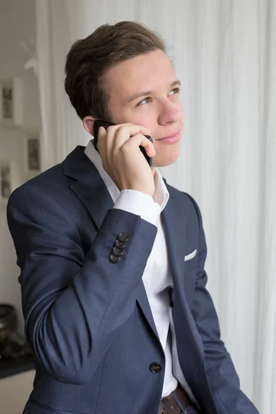 young businessman on the phone