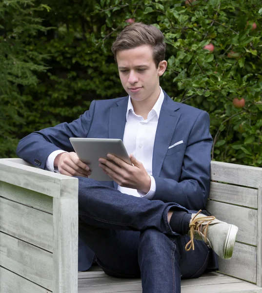 Young businessman with tablet — Stock Photo, Image