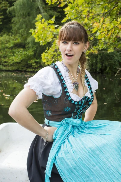 Young woman in dirndl — Stock Photo, Image