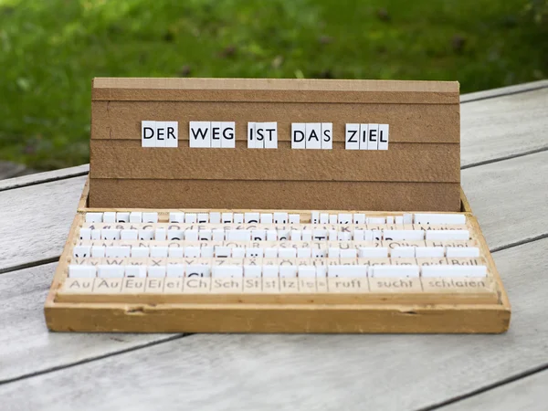 Text: "Der Weg ist das Ziel" — Stockfoto