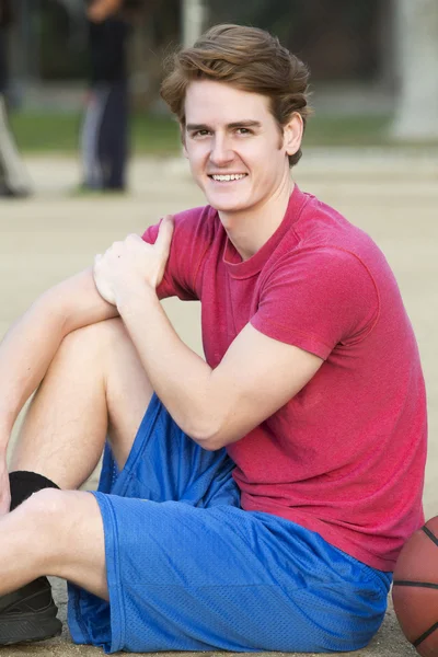 Young man with basketball — Stock Photo, Image