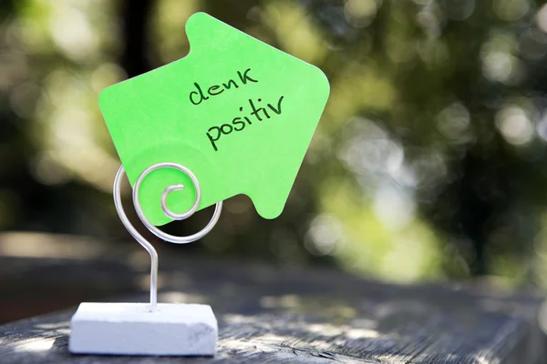 Handwritten german words "Denk Positiv" (think positive) — Stock Photo, Image