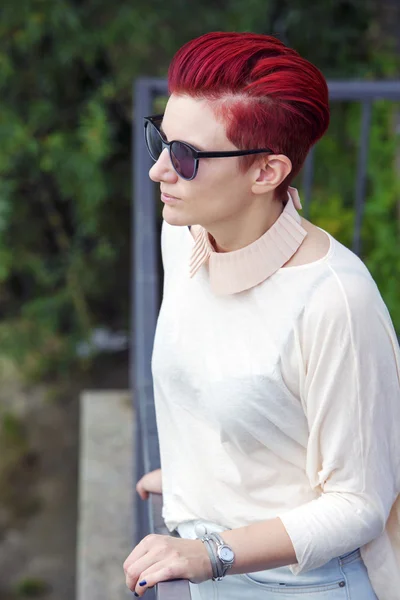 Portrait of red-haired woman with sunglasses — Stock Photo, Image