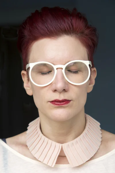 Portrait of red-haired woman with eyes closed — Stock Photo, Image