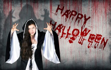 Mutlu Halloween cadı yanındaki duvarda püskürtülür