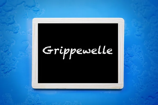 Almanca kelime 'Grippewelle' (grip sezonu) — Stok fotoğraf