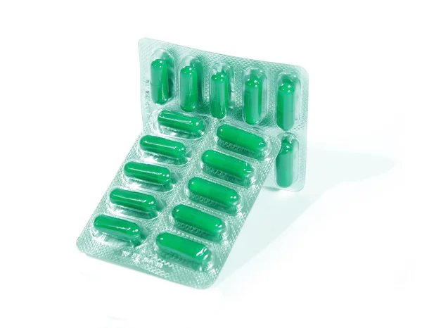 Cápsula de comprimido verde —  Fotos de Stock