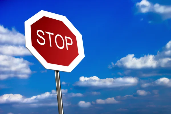 Зупинити знак на блакитному небі — стокове фото