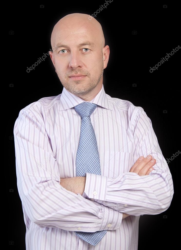 Man in a striped shirt and tie