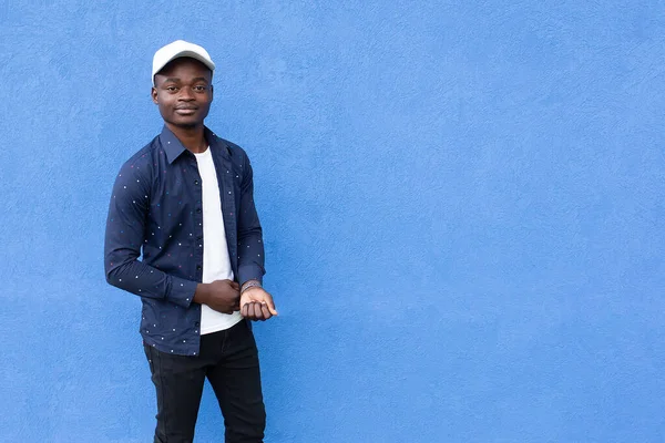 the Happy African American on a blue background