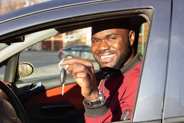 the Happy African American with car key