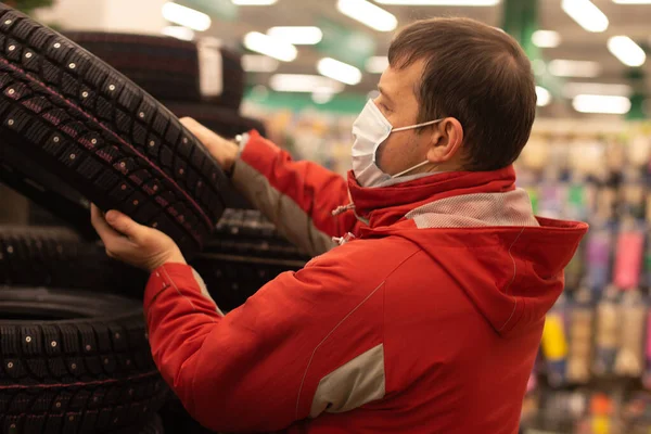 the Winter rubber sale, car dealership, man