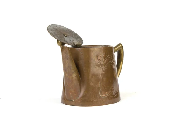 Antique copper teapot on white Stock Image