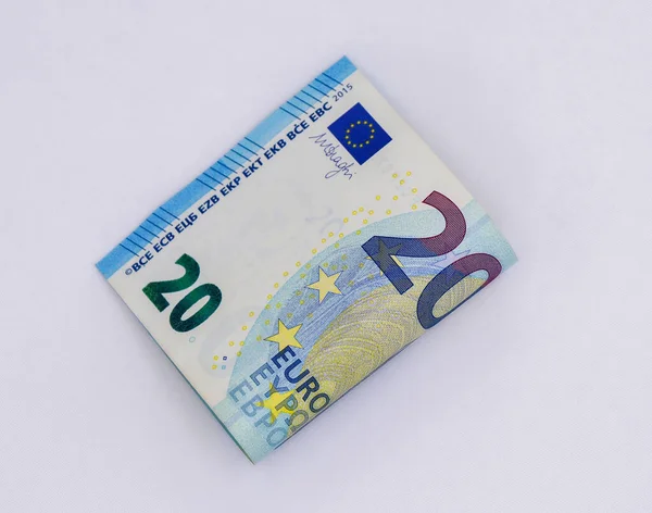 Een Witte Ondergrond Een Biljet Van Euro Tweeën Gevouwen Vrije — Stockfoto