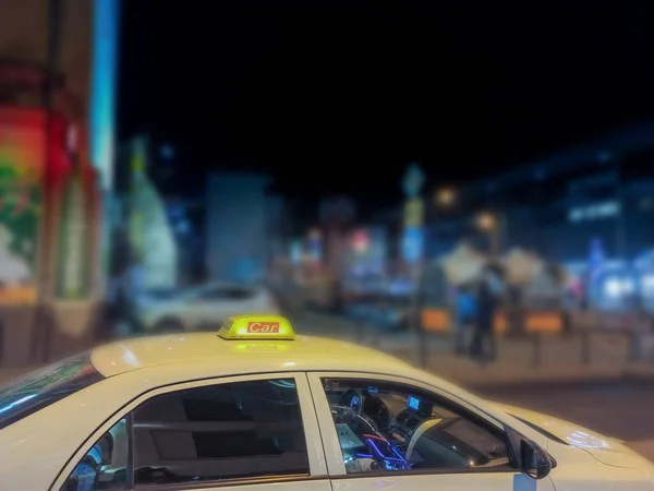 Taxi Car Parked Passenger Night Blurred City Shallow Depth Field — Photo