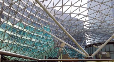 WARSAW, POLAND - May 27, 2018. Wide angle Interior of Zlote Tarasy Shopping Centre and Mall top ceiling one of the tourists attraction. Abstract modern building architecture. Geometry symmetry