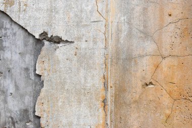 Çatlamış beton duvar çimento yüzeyi arka planına dönüştürülmüş.