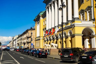 Four Seasons Hotel Lion Palace St. Petersburg and Saint Isaac's Cathedral or Isaakievskiy Sobor in Saint Petersburg, Russia. clipart