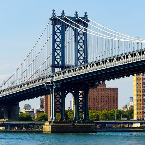 The Manhattan Bridge is a suspension bridge that crosses the East River in New York City, connecting Lower Manhattan at Canal Street with Downtown Brooklyn