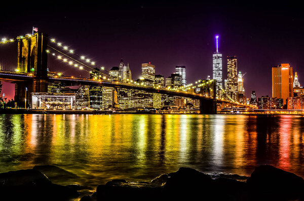 The Brooklyn Bridge is a bridge in New York City, spanning the East River between the boroughs of Manhattan and Brooklyn.