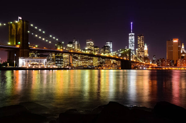 The Brooklyn Bridge is a bridge in New York City, spanning the East River between the boroughs of Manhattan and Brooklyn.