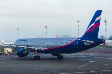 Aeroflot - Russian Airlines Airbus A320-200 taxing for take off at the Perm Bolshoe Savino Airport in Perm, Russia clipart
