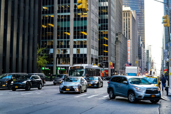 New York City Manhattan street panorama with yellow New York City taxi cabs on the streets. Manhattan, New York.