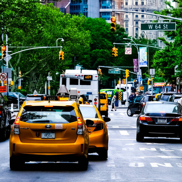 New York City Manhattan street panorama with yellow New York City taxi cabs on the street. Manhattan, New York.