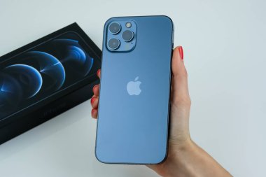 iPhone 12 Pro Max in Pacific Blue.