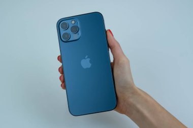 iPhone 12 Pro Max in Pacific Blue.