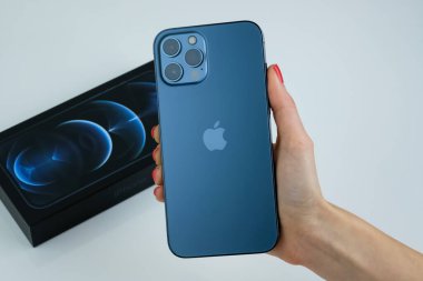 iPhone 12 Pro Max in Pacific Blue.