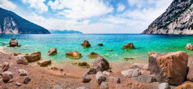Panoramic view of Myrtos Beach. Colorful morning scene of Cephalonia island, Divarata village location, Greece, Europe. Bright spring seascape of Ionian Sea. Beauty of nature concept background. clipart