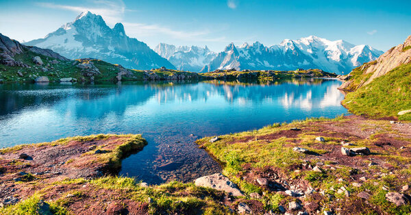 Colorful summer view of the Lac Blanc lake with Mont Blanc (Monte Bianco) on background, Chamonix location. Beautiful outdoor scene in Vallon de Berard Nature Preserve, Graian Alps, France, Europe. 